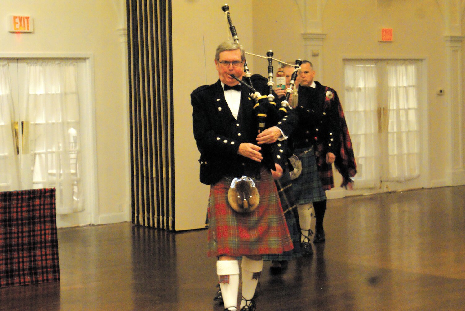 PIPE AND DANCE: Piper Jack MacLean performs a marching tune.